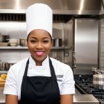 Chef Kaiya Monroe in professional kitchen attire